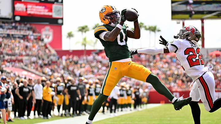 Green Bay Packers wide receiver Matthew Golden (0) catvches the ball over Tampa Bay Buccaneers defensive back Keionte Scott (22) at Raymond James Stadium. Green Bay Packers wide receiver Matthew Golden (0) catvches the ball over Tampa Bay Buccaneers defensive back Keionte Scott (22) at Raymond James Stadium.