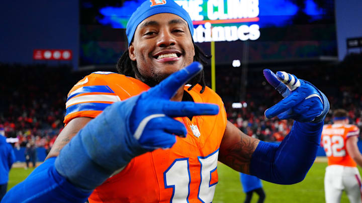 Jan 5, 2025; Denver, Colorado, USA; Denver Broncos linebacker Nik Bonitto (15) following the win against the Kansas City Chiefs at Empower Field at Mile High. Mandatory Credit: Ron Chenoy-Imagn Images