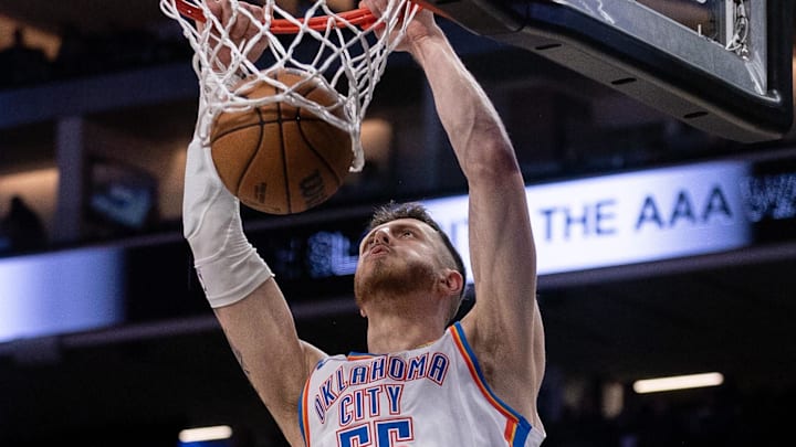 Nov 25, 2024; Sacramento, California, USA; Oklahoma City Thunder center Isaiah Hartenstein (55) dunks the ball against the Sacramento Kings during the third quarter at Golden 1 Center. Mandatory Credit: Ed Szczepanski-Imagn Images