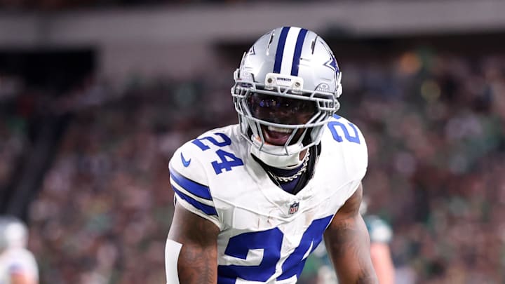Sep 4, 2025; Philadelphia, Pennsylvania, USA; Dallas Cowboys running back Miles Sanders (24) reacts after a carry against the Philadelphia Eagles during the third quarter of the game at Lincoln Financial Field. Mandatory Credit: Bill Streicher-Imagn Images