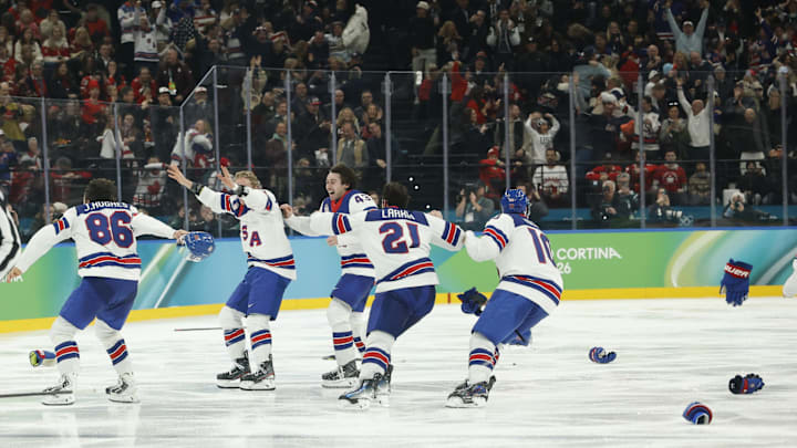 Jack Hughes #86 of Team United States celebrates with teammates during the Milano Cortina 2026 Olympic Winter Games: Geoff Burke-Imagn Images