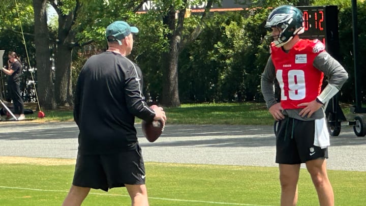 Eagles QB coach Scott Loeffler tutors Kyle McCord on May 2, 2025 at Rookie Camp.