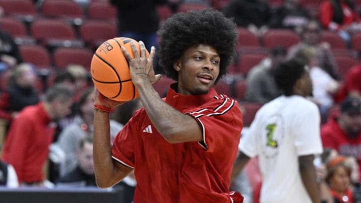 Jan 10, 2026; Louisville, Kentucky, USA;  Louisville Cardinals guard London Johnson (5) warms up before the first half against the Boston College Eagles at KFC Yum! Center. Mandatory Credit: Jamie Rhodes-Imagn Images