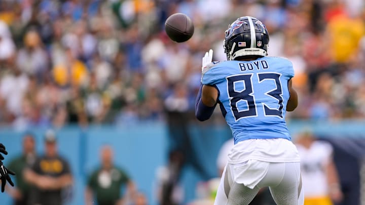Sep 22, 2024; Nashville, Tennessee, USA;  Tennessee Titans wide receiver Tyler Boyd (83) makes a catch against the Green Bay Packers during the first half at Nissan Stadium. Mandatory Credit: Steve Roberts-Imagn Images