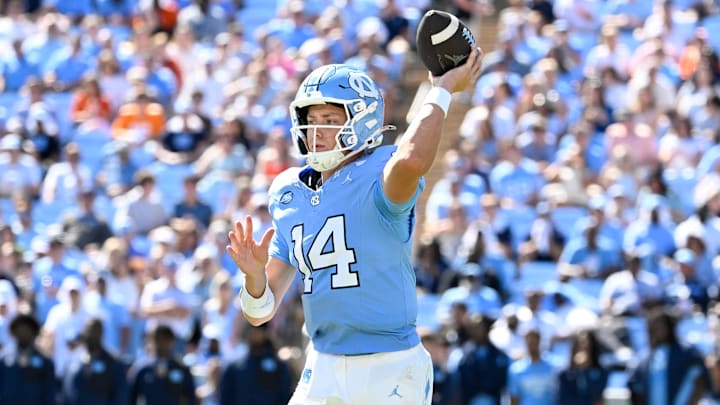 Oct 4, 2025; Chapel Hill, North Carolina, USA; North Carolina Tar Heels quarterback Max Johnson (14) looks to pass in the second quarter at Kenan Stadium. Mandatory Credit: Bob Donnan-Imagn Images