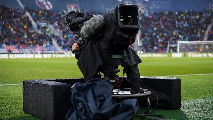 A cameraman works with a TV camera prior to the Serie A