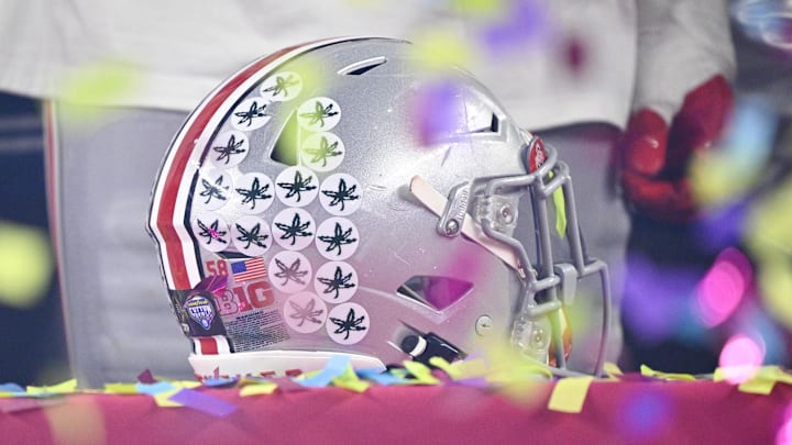 Jan 10, 2025; Arlington, TX, USA; A view of an Ohio State Buckeyes helmet and confetti after the Buckeyes defeat the Texas Longhorns at AT&T Stadium. Mandatory Credit: Jerome Miron-Imagn Images