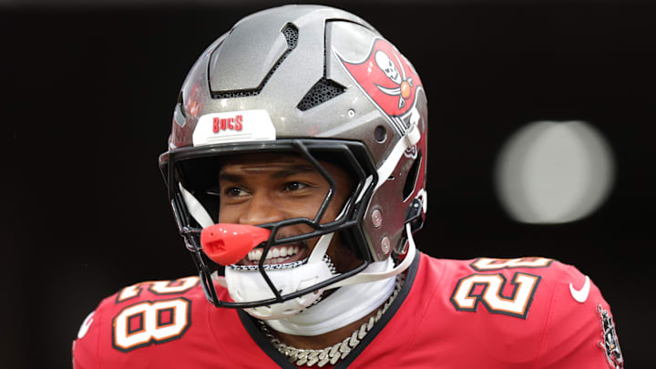 Aug 9, 2025; Tampa, Florida, USA; Tampa Bay Buccaneers safety Shilo Sanders (28) takes the field for warmups before a preseason game against the Tennessee Titans at Raymond James Stadium. Mandatory Credit: Nathan Ray Seebeck-Imagn Images