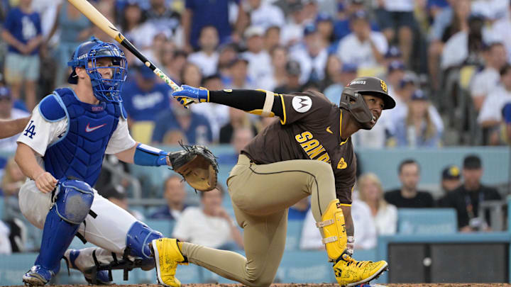 Oct 11, 2024; Los Angeles, California, USA; San Diego Padres outfielder Jurickson Profar (10) reacts at bat in the fourth inning against the Los Angeles Dodgers during game five of the NLDS for the 2024 MLB Playoffs at Dodger Stadium. Mandatory Credit: Jayne Kamin-Oncea-Imagn Images