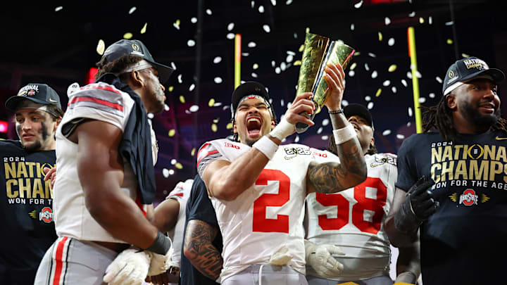 Jan 20, 2025; Atlanta, GA, USA; Ohio State Buckeyes wide receiver Emeka Egbuka (2) celebrates after winning against the Notre Dame Fighting Irish in the CFP National Championship college football game at Mercedes-Benz Stadium. Mandatory Credit: Mark J. Rebilas-Imagn Images