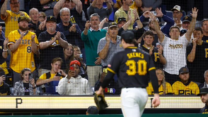 Pittsburgh Pirates fans applauding Paul Skenes.
