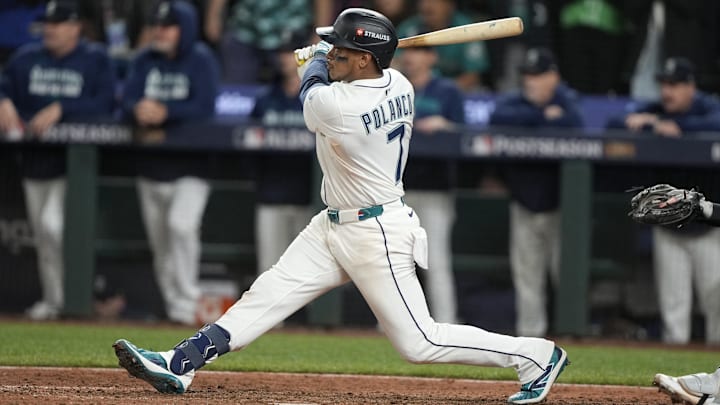 Oct 10, 2025; Seattle, Washington, USA; Seattle Mariners second baseman Jorge Polanco (7) hits a walk off single against the Detroit Tigers during the fifteenth inning during game five of the ALDS round for the 2025 MLB playoffs at T-Mobile Park.  Mandatory Credit: Stephen Brashear-Imagn Images
