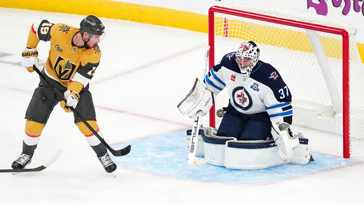 Winnipeg Jets goaltender Connor Hellebuyck (37) makes a save against a deflection by Vegas Golden Knights right wing Reilly Smith (19) during the third period at T-Mobile Arena. Mandatory Credit: Stephen R. Sylvanie-Imagn Images Winnipeg Jets goaltender Connor Hellebuyck (37) makes a save against a deflection by Vegas Golden Knights right wing Reilly Smith (19) during the third period at T-Mobile Arena. Mandatory Credit: Stephen R. Sylvanie-Imagn Images