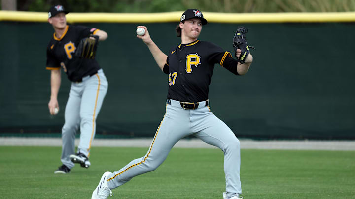 Feb 12, 2025; Bradenton, FL, USA;  Pittsburgh Pirates pitcher Bubba Chandler and pitcher Mitch Keller (23) during spring training works out at Pirate City. Mandatory Credit: Kim Klement Neitzel-Imagn Images