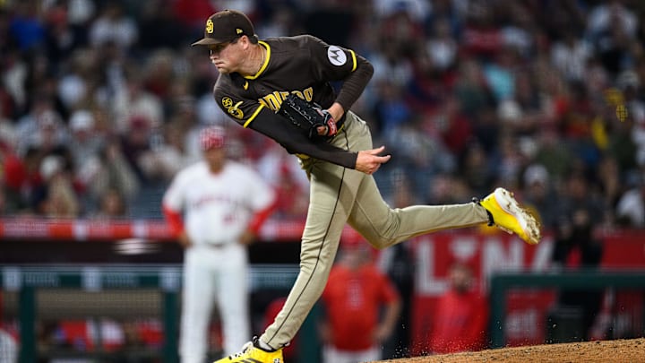 Apr 18, 2026; Anaheim, California, USA; San Diego Padres pitcher Mason Miller (22) delivers during the ninth inning against the Los Angeles Angels at Angel Stadium. Mandatory Credit: William Liang-Imagn Images