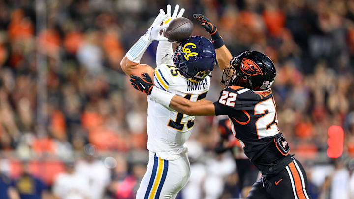 Aug 30, 2025; Corvallis, Oregon, USA; Oregon State Beavers defensive back Jalil Tucker (22) breaks up a pass intended for California Golden Bears wide receiver Mark Hamper (15) during the second quarter at Reser Stadium. Mandatory Credit: Craig Strobeck-Imagn Images Aug 30, 2025; Corvallis, Oregon, USA; Oregon State Beavers defensive back Jalil Tucker (22) breaks up a pass intended for California Golden Bears wide receiver Mark Hamper (15) during the second quarter at Reser Stadium. Mandatory Credit: Craig Strobeck-Imagn Images