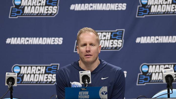 Mar 18, 2026; Portland, OR, USA; BYU Cougars head coach Kevin Young answers questions during a press conference before a practice session ahead of the first round of the men's 2026 NCAA Tournament at Moda Center. Mandatory Credit: Troy Wayrynen-Imagn Images