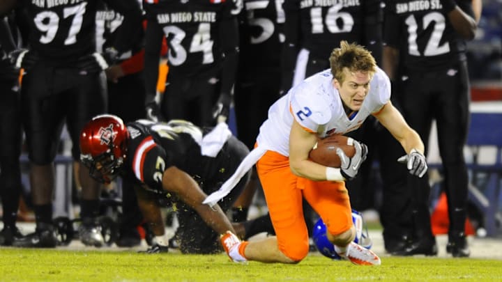 Boise State receiver Matt Miller runs after losing his helmet. Miller will be the Broncos' co-offensive coordinator in 2025. 