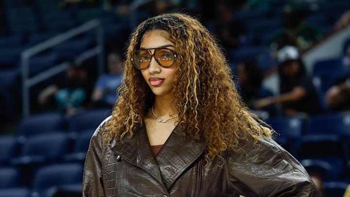 Sep 11, 2025; Chicago, Illinois, USA; Injured Chicago Sky forward Angel Reese (5) stands on the sidelines before a WNBA game against the New York Liberty at Wintrust Arena. Mandatory Credit: Kamil Krzaczynski-Imagn Images