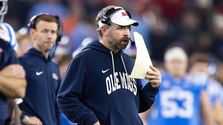 Jan 8, 2026; Glendale, AZ, USA; Mississippi Rebels head coach Pete Golding against the Miami Hurricanes during the 2026 Fiesta Bowl and semifinal game of the College Football Playoff at State Farm Stadium. Mandatory Credit: Mark J. Rebilas-Imagn Images Jan 8, 2026; Glendale, AZ, USA; Mississippi Rebels head coach Pete Golding against the Miami Hurricanes during the 2026 Fiesta Bowl and semifinal game of the College Football Playoff at State Farm Stadium. Mandatory Credit: Mark J. Rebilas-Imagn Images
