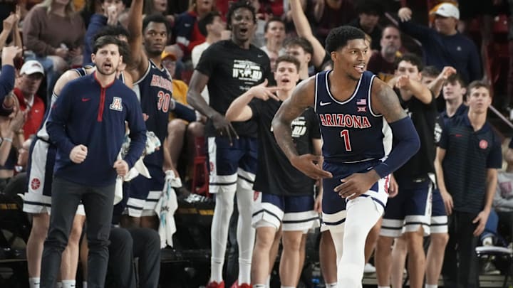Feb 1, 2025; Tempe, Ariz., U.S.; Arizona Wildcats guard Caleb Love (1) reacts after sinking a 3-point shot during a Big 12 menÕs basketball game against the Arizona State Sun Devils at Desert Financial Arena.