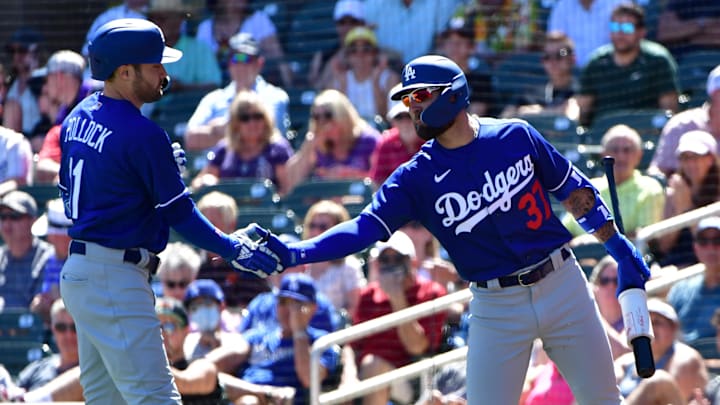 Mar 24, 2022; Salt River Pima-Maricopa, Arizona, USA; Los Angeles Dodgers left fielder AJ Pollock (11) celebrates with right fielder Kevin Pillar (37) after hitting a solo home run in the third inning against the Colorado Rockies during spring training at Salt River Fields at Talking Stick. Mandatory Credit: Matt Kartozian-Imagn Images Mar 24, 2022; Salt River Pima-Maricopa, Arizona, USA; Los Angeles Dodgers left fielder AJ Pollock (11) celebrates with right fielder Kevin Pillar (37) after hitting a solo home run in the third inning against the Colorado Rockies during spring training at Salt River Fields at Talking Stick. Mandatory Credit: Matt Kartozian-Imagn Images