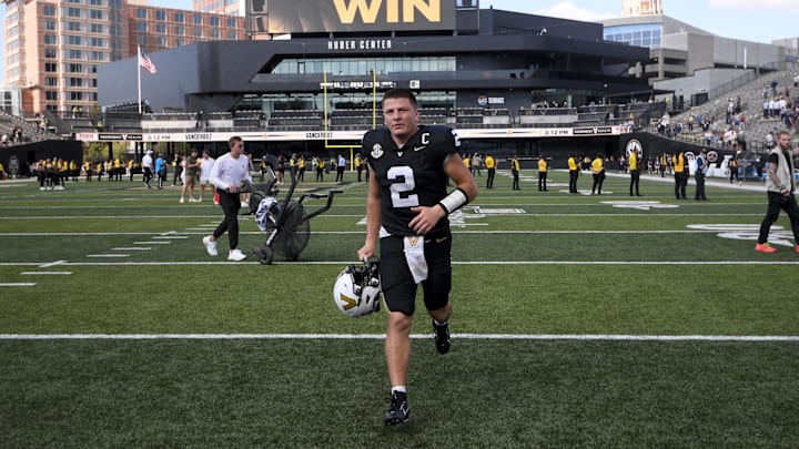 Sep 27, 2025; Nashville, Tennessee, USA;  Vanderbilt Commodores quarterback Diego Pavia (2) runs off the field after the win against the Utah State Aggies after the game at FirstBank Stadium. Mandatory Credit: Steve Roberts-Imagn Images