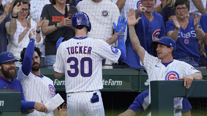 Jul 19, 2025; Chicago, Illinois, USA; Chicago Cubs outfielder Kyle Tucker (30) is greeted by  manager Craig Counsell (right) after hitting a home run against the Boston Red Sox during the first inning at Wrigley Field