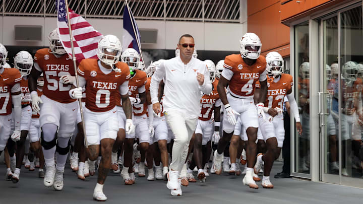Texas Longhorns head coach Steve Sarkisian leads players on to the field before the game against the San Jose State Spartans. 