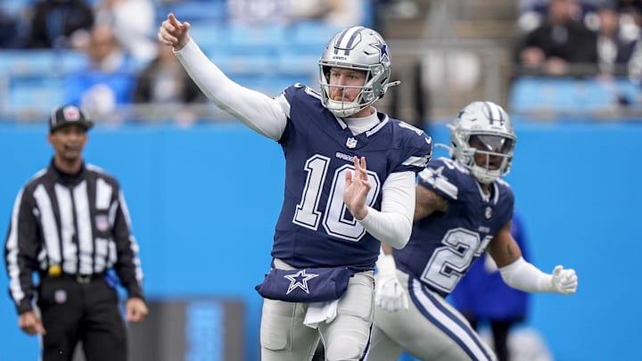 Dec 15, 2024; Charlotte, North Carolina, USA; Dallas Cowboys quarterback Cooper Rush (10) throws a pass  during the first quarter against the Carolina Panthers at Bank of America Stadium. Mandatory Credit: Jim Dedmon-Imagn Images