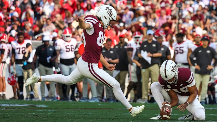 Mississippi State Bulldogs kicker Kyle Ferrie (80) kicks an extra point against the Georgia Bulldogs during the second half at Davis Wade Stadium at Scott Field. Mississippi State Bulldogs kicker Kyle Ferrie (80) kicks an extra point against the Georgia Bulldogs during the second half at Davis Wade Stadium at Scott Field.