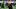 Dec 31, 2025; Arlington, TX, USA; Miami Hurricanes head coach Mario Cristobal greets former Dallas Cowboys head coach Jimmy J