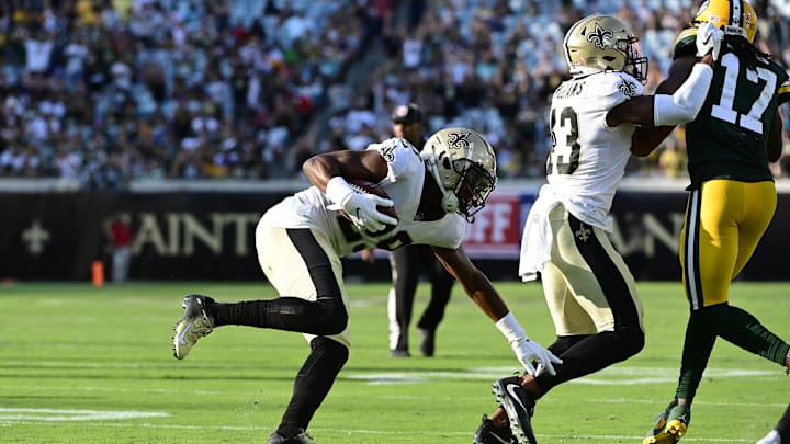 New Orleans Saints cornerback Paulson Adebo intercepted a pass against the Packers in his NFL debut in 2021.