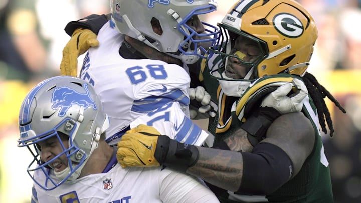 Green Bay Packers defensive end Rashan Gary (52) sacks Detroit Lions quarterback Jared Goff on Sunday.