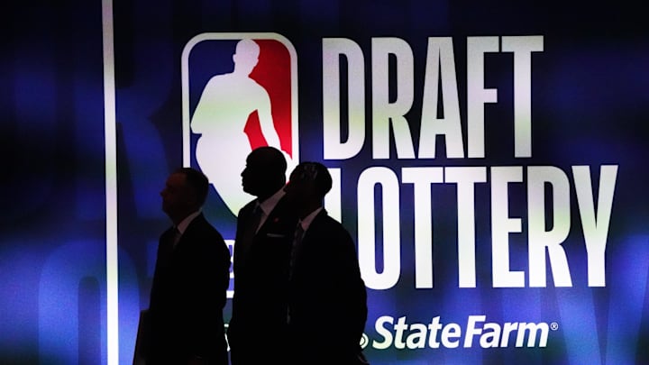 May 16, 2023; Chicago, IL, USA; People walk past the 2023 NBA Draft Lottery board at McCormick Place