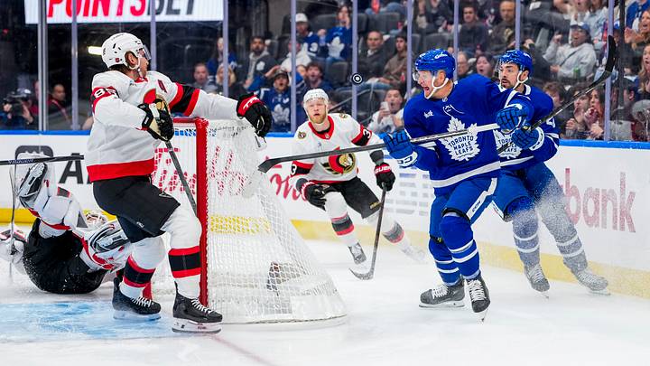 Jake Sanderson amidst a puck battle in one of his only six shifts in the Senators season opener before leaving with an undisclosed injury. Jake Sanderson amidst a puck battle in one of his only six shifts in the Senators season opener before leaving with an undisclosed injury.