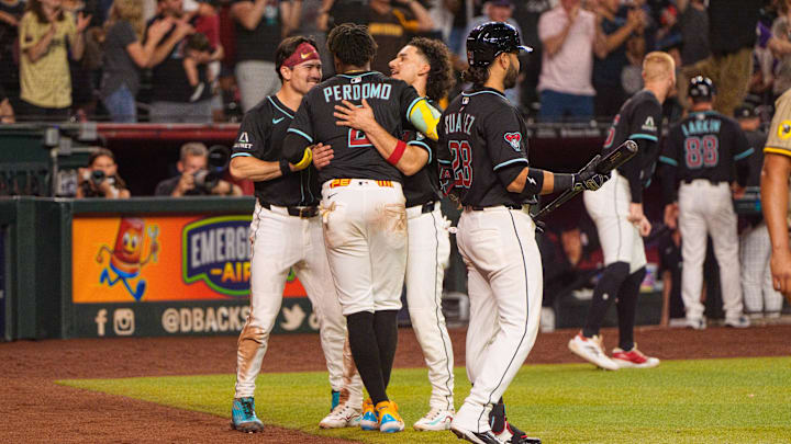 Jun 14, 2025; Phoenix, Arizona, USA; Arizona Diamondbacks infielder Geraldo Perdomo (2) celebrates with outfielder Corbin Carroll (7) and outfielder Alek Thomas (5) after scoring the winning run in the ninth inning against the San Diego Padres at Chase Field. Mandatory Credit: Allan Henry-Imagn Images Jun 14, 2025; Phoenix, Arizona, USA; Arizona Diamondbacks infielder Geraldo Perdomo (2) celebrates with outfielder Corbin Carroll (7) and outfielder Alek Thomas (5) after scoring the winning run in the ninth inning against the San Diego Padres at Chase Field. Mandatory Credit: Allan Henry-Imagn Images