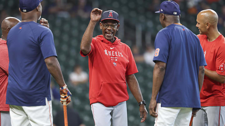 Sep 22, 2024; Houston, Texas, USA; Los Angeles Angels manager Ron Washington talks with Houston Astros coaches on the field before the game at Minute Maid Park. Mandatory Credit: Troy Taormina-Imagn Images