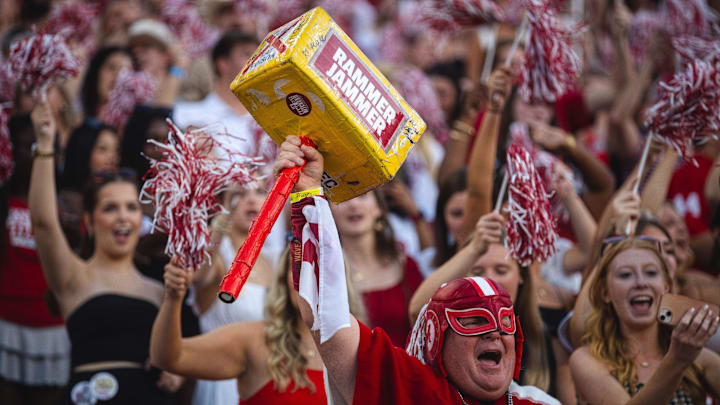 Oct 26, 2024; Tuscaloosa, Alabama, USA;  Alabama Crimson Tide fans cheer and sing “Dixie Land Delight” during the fourth quarter against the Missouri Tigers at Bryant-Denny Stadium. Mandatory Credit: Will McLelland-Imagn Images