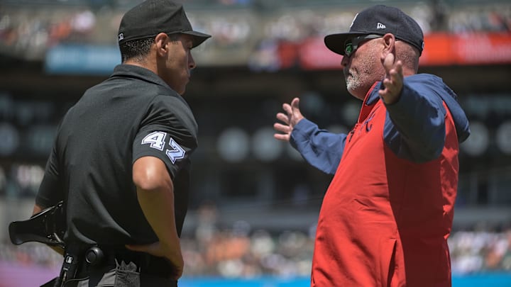 Atlanta Braves manager Brian Snitker argues a call with umpire Gabe Morales (47) during the fifth inning of the game against the San Francisco Giants at Oracle Park.