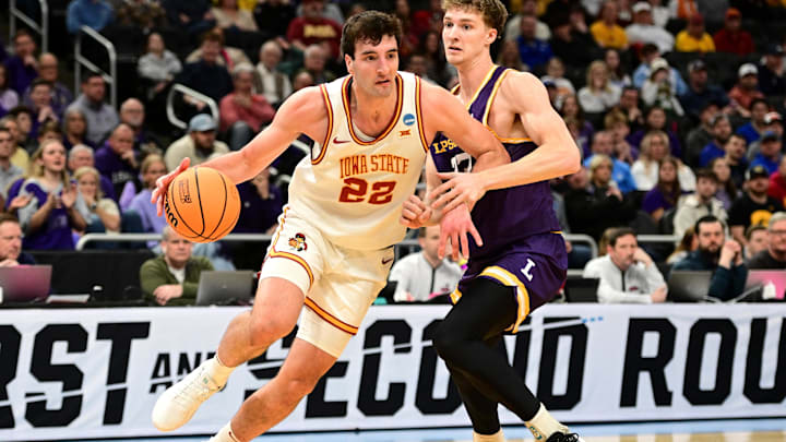 Mar 21, 2025; Milwaukee, WI, USA; Iowa State Cyclones forward Milan Momcilovic (22) drives to the basket during the first half of a first round NCAA men’s tournament game at Fiserv Forum. Mandatory Credit: Benny Sieu-Imagn Images