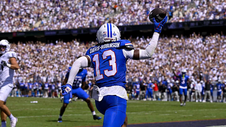 Sep 20, 2025; Fort Worth, Texas, USA; SMU Mustangs cornerback Jaelyn Davis-Robinson (13) intercepts a pass intended for TCU Horned Frogs wide receiver Eric McAlister (not pictured) during the first half at Amon G. Carter Stadium. Mandatory Credit: Jerome Miron-Imagn Images Sep 20, 2025; Fort Worth, Texas, USA; SMU Mustangs cornerback Jaelyn Davis-Robinson (13) intercepts a pass intended for TCU Horned Frogs wide receiver Eric McAlister (not pictured) during the first half at Amon G. Carter Stadium. Mandatory Credit: Jerome Miron-Imagn Images
