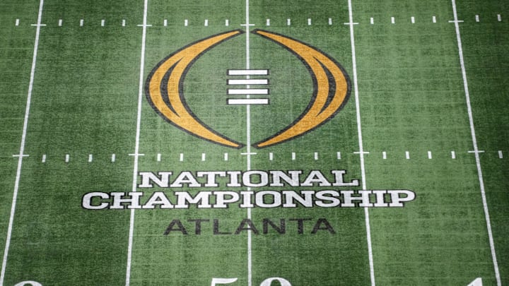 Jan 19, 2025; Atlanta, GA, USA; The College Football Playoff National Championship logo at midfield at Mercedes-Benz Stadium, the site of the 2025 College Football Playoff National Championship between the Ohio State Buckeyes and the Notre Dame Fighting Irish. Mandatory Credit: Kirby Lee-Imagn Images