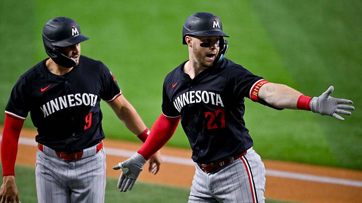 Aug 18, 2024; Arlington, Texas, USA; Minnesota Twins designated hitter Trevor Larnach (9) and catcher Ryan Jeffers (27) celebrate a two-run home run by Jeffers against the Texas Rangers during the first inning at Globe Life Field. Mandatory Credit: Jerome Miron-USA TODAY Sports Aug 18, 2024; Arlington, Texas, USA; Minnesota Twins designated hitter Trevor Larnach (9) and catcher Ryan Jeffers (27) celebrate a two-run home run by Jeffers against the Texas Rangers during the first inning at Globe Life Field. Mandatory Credit: Jerome Miron-USA TODAY Sports
