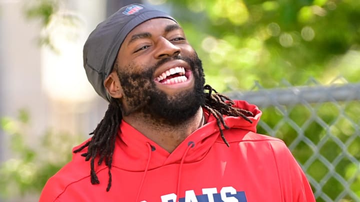 Aug 2, 2023; Foxborough, MA, USA; New England Patriots linebacker Matthew Judon (9) heads to the practice fields at Gillette Stadium. Mandatory Credit: Eric Canha-Imagn Images