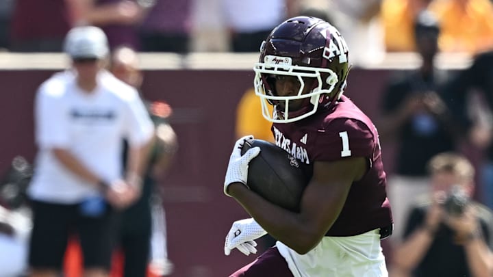 Oct 5, 2024; College Station, Texas, USA; Texas A&M Aggies wide receiver Jabre Barber (1) runs the ball in the first half against the Missouri Tigers at Kyle Field. Mandatory Credit: Maria Lysaker-Imagn Images. 