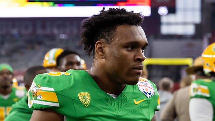Jan 1, 2024; Glendale, AZ, USA; Oregon Ducks linebacker Devon Jackson (26) against the Liberty Flames during the 2024 Fiesta Bowl at State Farm Stadium. 