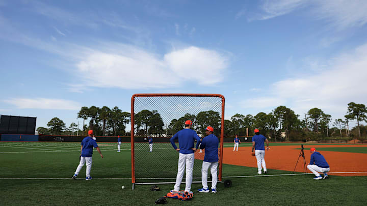 The New York Mets pitchers and catchers take part in their first day of spring training on the back fields of Clover Park on Feb. 11, 2026, in Port St. Lucie.