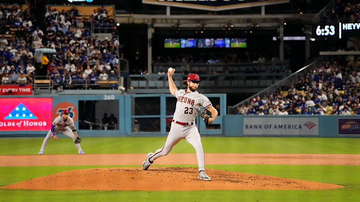 Arizona Diamondbacks starting pitcher Zac Gallen (23) throws to the Los Angeles Dodgers in the second inning during Game 2 of the NLDS at Dodger Stadium in Los Angeles on Oct. 9, 2023.
