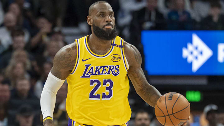 Apr 25, 2025; Minneapolis, Minnesota, USA; Los Angeles Lakers forward LeBron James (23) dribbles the ball down the court against the Minnesota Timberwolves during game three of first round for the 2024 NBA Playoffs at Target Center. Mandatory Credit: Jesse Johnson-Imagn Images